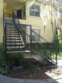 Final coat of paint for metal stairs