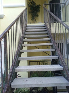 Sanding metal staircase